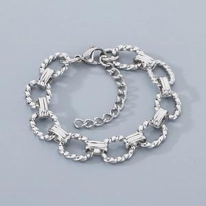 Close-up of silver screw thread O-chain bracelet with lobster clasp and extension link