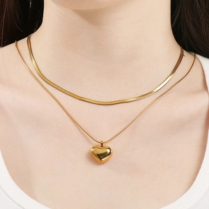 Double layer 18K gold heart pendant necklace with snake chain and fine link design