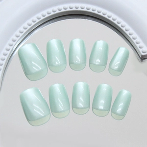 Mint green cat eye press-on nails with aurora pearl finish and squoval shape 30pcs