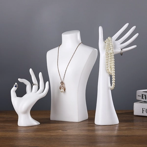 Three-piece white resin jewelry display stand set including bust and hand models