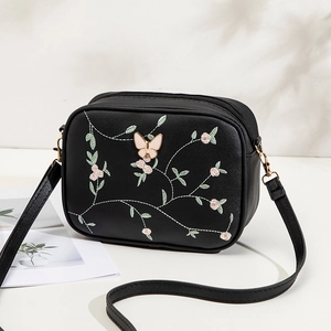 Schwarze Kamera-Umhängetasche mit rosa Blumenstickerei und 3D-Schmetterlingsdekor