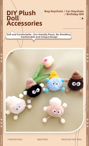 Close-up of colorful plush doll shoe charms with knitted hats and fluffy faux fur balls