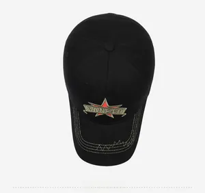 Close-up of black ranger cap with red star embroidery and yellow stitching details