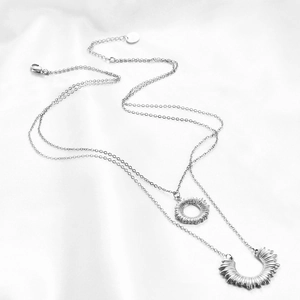Double-layered 304 stainless steel necklace with sun and moon pendants on white silk