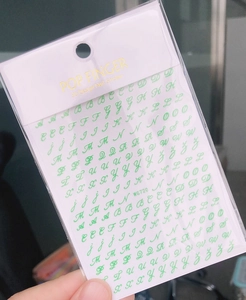 Detail of green 3D alphabet nail art stickers model WG720 with crisp lettering