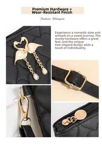 Detail of black quilted crossbody bag with golden swan charms and metallic hardware