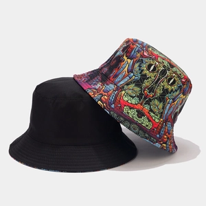 Detail of reversible bucket hat showing black side and vibrant psychedelic art print canvas
