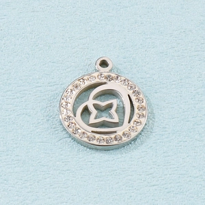 Silver stainless steel round pendant with heart clover cutout and sparkling rhinestones