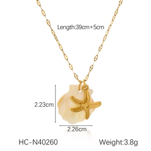 Detailed dimensions of 18K gold starfish and seashell pendant necklace with size markers