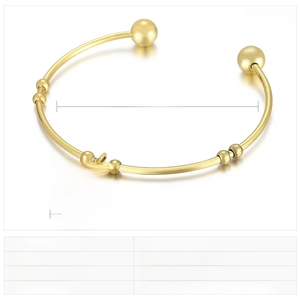 Close-up of gold stainless steel bangle with LOVE pendant and dimension specifications