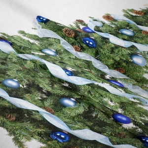 Detail shot of Christmas fabric with pine branches, pinecones and woven texture