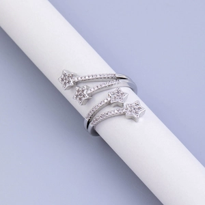 Silver twisted open ring with cascading zircon stars and minimalist polished metal band