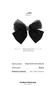 Detail view of large mesh bow hair clip with size dimensions 17cm and 10cm