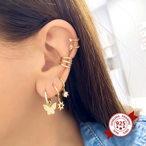 S925 silver gold butterfly and star zircon earrings with ear cuffs on model