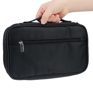 Trousse à pinceaux de maquillage noire avec poignée supérieure et double compartiment zippé