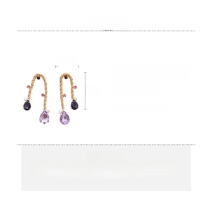 Detail view showing purple teardrop earrings dimensions of 7cm x 2.2cm in copper and rhinestone
