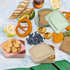 Umweltfreundliche Lunchboxen in Toastform aus Weizenstroh in Grün, Beige und Rosa