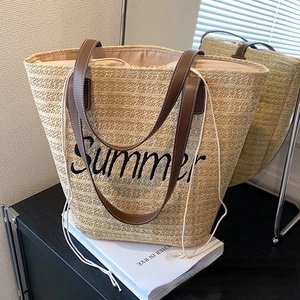Straw tote bag with Summer embroidery and brown leather straps for beach vacation