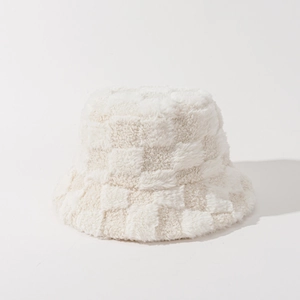 Detailed macro view of the soft plush texture and checkerboard pattern on a white bucket hat