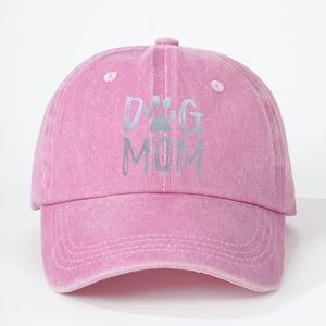 Pink washed cotton baseball cap with Dog Mom print and paw graphic in a classic outdoor style