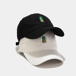 Classic baseball cap with pineapple embroidery in black and ivory white cotton canvas