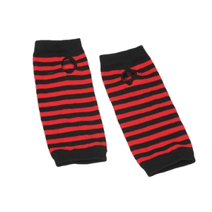 Detail of red and black striped knitted arm warmers with thumb holes and punk style texture
