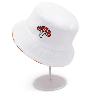 White reversible bucket hat with mushroom embroidery and orange checkered lining