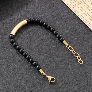Men's matte black onyx beaded bracelet with gold curved stainless steel tube
