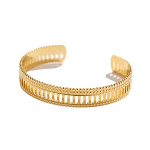 Minimalist gold titanium open cuff bracelet featuring retro hollow pattern design