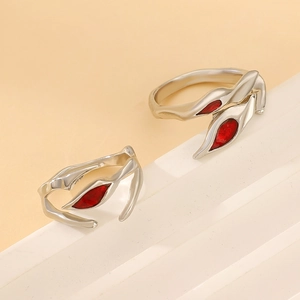 Gothic punk adjustable open rings with red teardrop gems on silver metal leaves