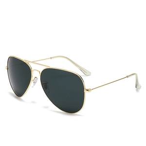 Classic aviator sunglasses with gold metal frame and dark green lenses shown from 45-degree angle