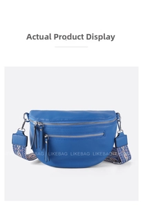 Detail of blue crossbody bag featuring double zippers and ethnic style woven strap