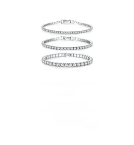 Detailed view of three stacked S925 silver tennis bracelets with round-cut zircon stones
