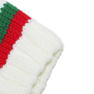 Close-up of thick ribbed knit texture with festive red, green and white stripes