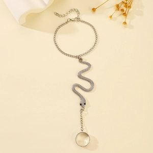 Silver snake hand chain bracelet with ring for Halloween featuring delicate metal scales