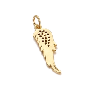 Macro detail of a 18K gold plated feather charm pendant for DIY necklace making