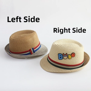 Detailed weave of kids straw hats with striped bands and decorative patches