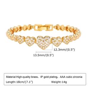 Macro detail of heart-shaped links with AAA cubic zirconia in gold-plated finish