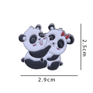 Cute cartoon hugging pandas alloy badge with red bow detail, size 2.5cm by 2.9cm