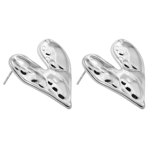 Macro detail of silver heart stud earrings with irregular liquid metal texture finish