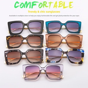 Collection of oversized square sunglasses in multiple colors with gold metal temples