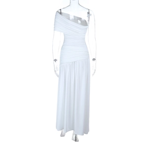 Detail of elegant white one-shoulder maxi dress with ruched body and asymmetric neckline