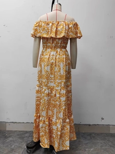 Rear view of yellow baroque print maxi dress with off-shoulder ruffles and layered skirt