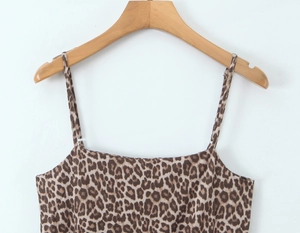 Close-up of leopard print camisole featuring thin straps and soft fabric texture