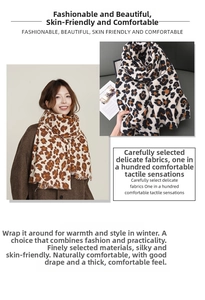 Detail of leopard print scarf showing thick faux cashmere texture and frayed edges
