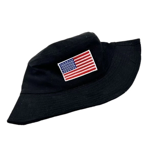 Close-up of the American flag embroidery on a black cotton bucket hat with white edging
