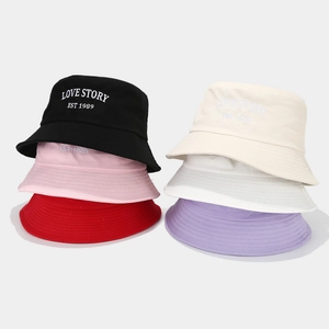 Multiple colors of Love Story embroidered cotton bucket hats for summer outdoor sun protection