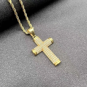 Macro shot of gold-plated hip hop cross pendant with shimmering cubic zirconia micro-pave