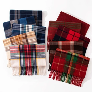 Winter plaid cashmere-like fringe scarf collection in various colors on white background