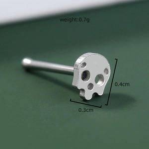 Detailed close-up of a silver skull nose stud with weight 0.7g and size measurements